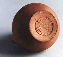 The base of a pot showing the Liberty seal